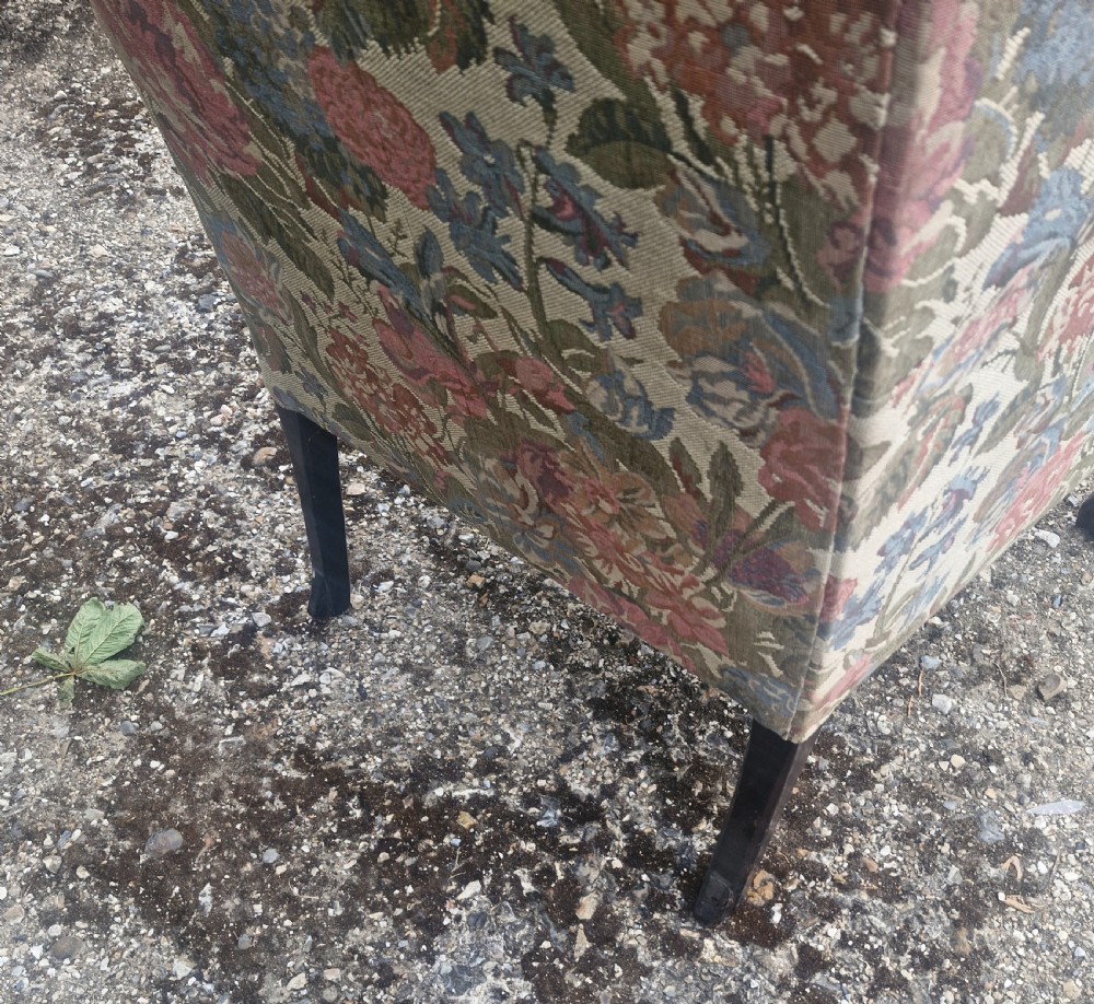 Edwardian mahogany framed wing back upholstered armchair on ball and Claw Feet. View II