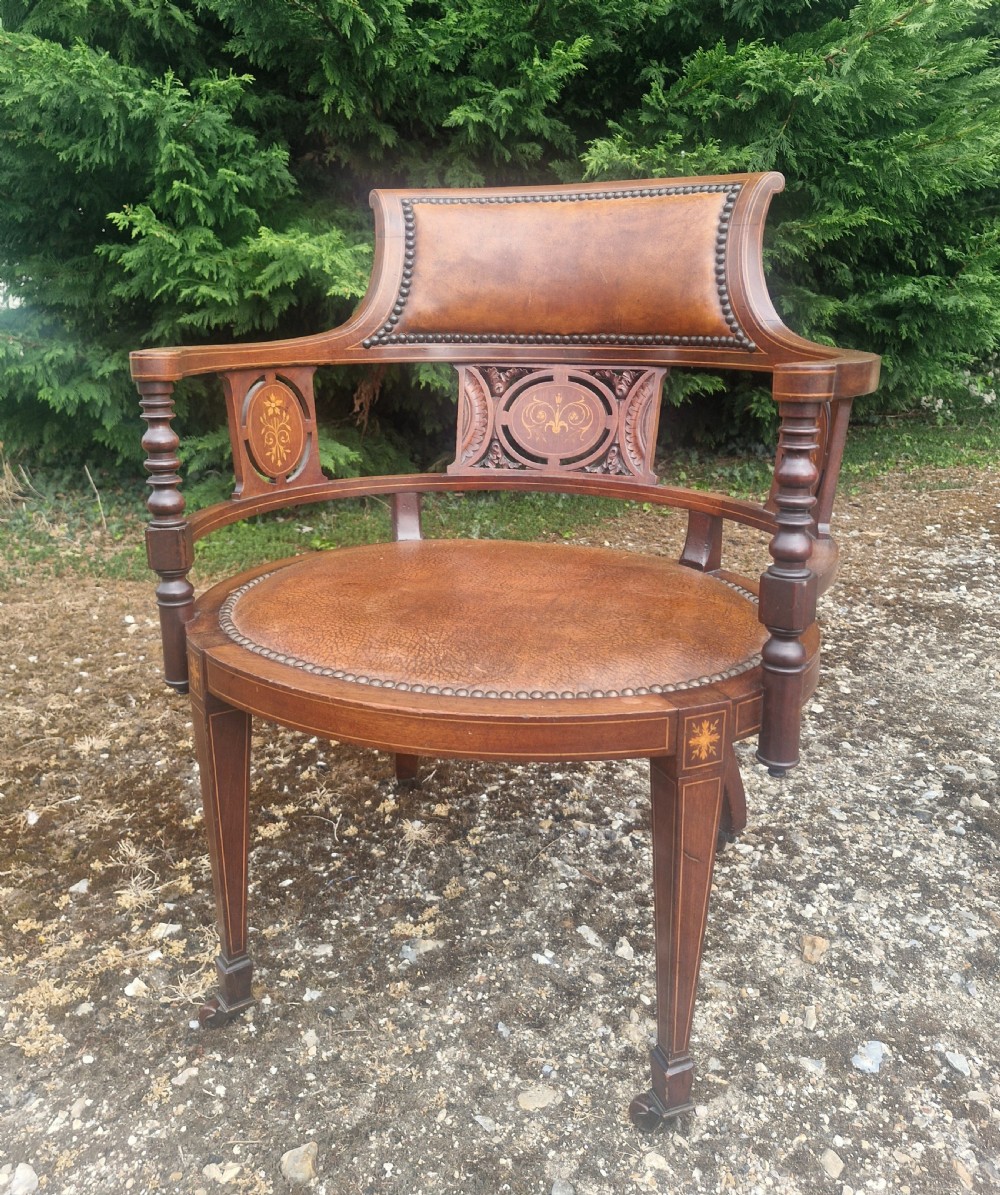 Edwardian inlaid mahogany leather upholstered armchair. 