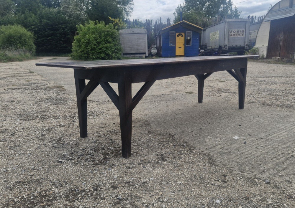 Good late Georgian oak farmhouse kitchen dining table.  View XIV