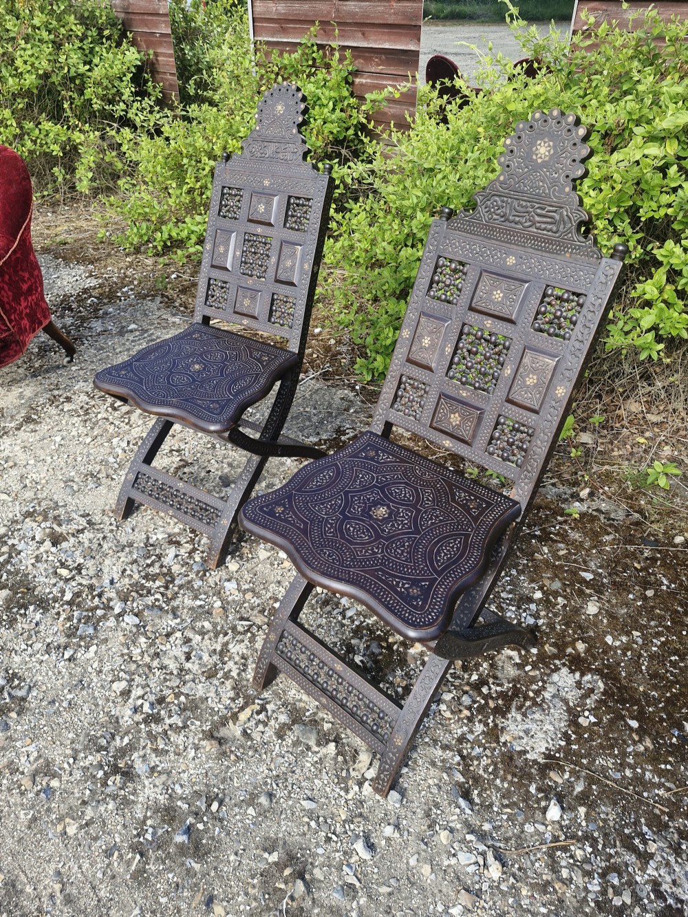 Pair of Late 19th century Moorish folding hall chairs.  View VII