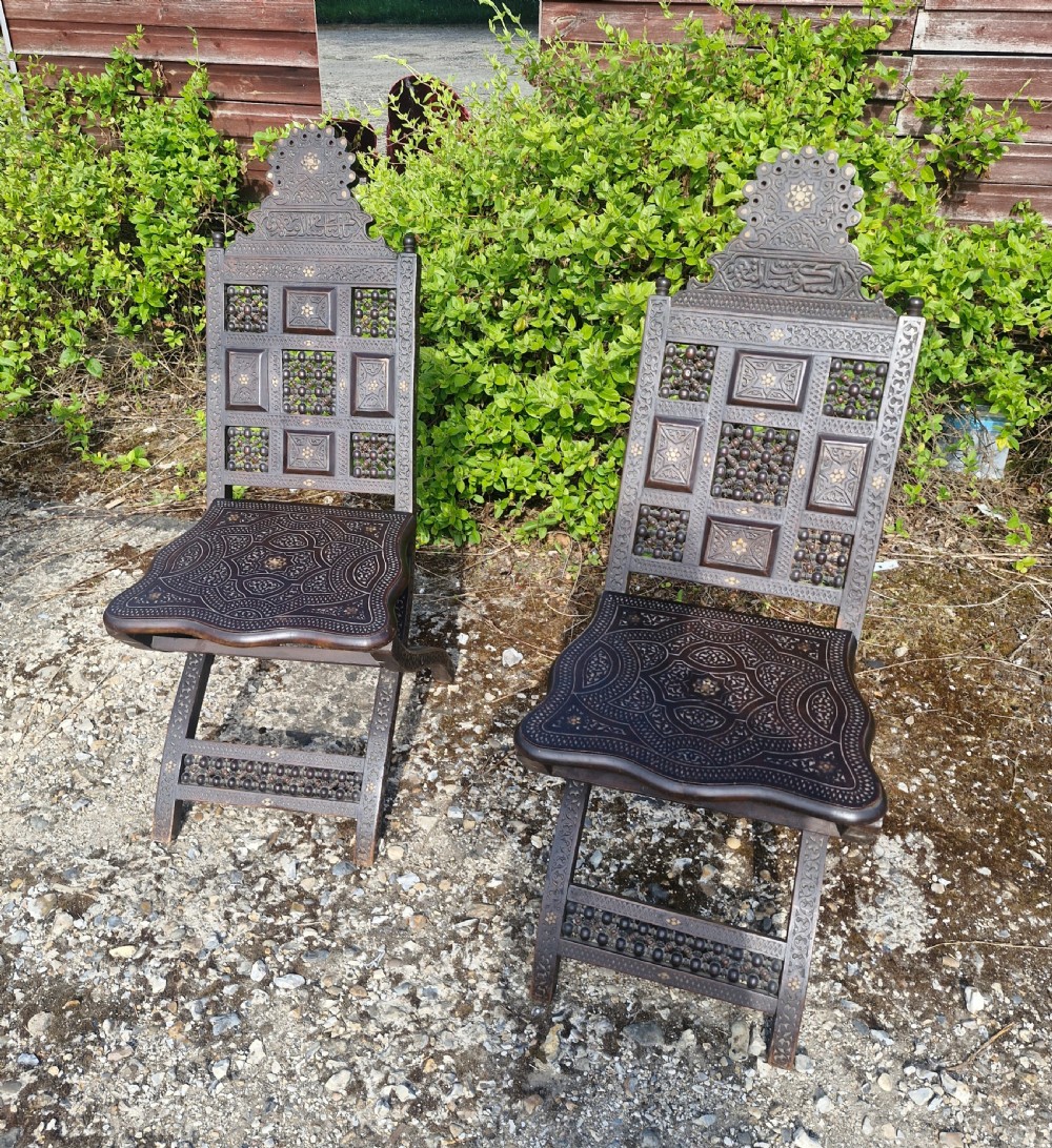 Pair of Late 19th century Moorish folding hall chairs.  View VIII