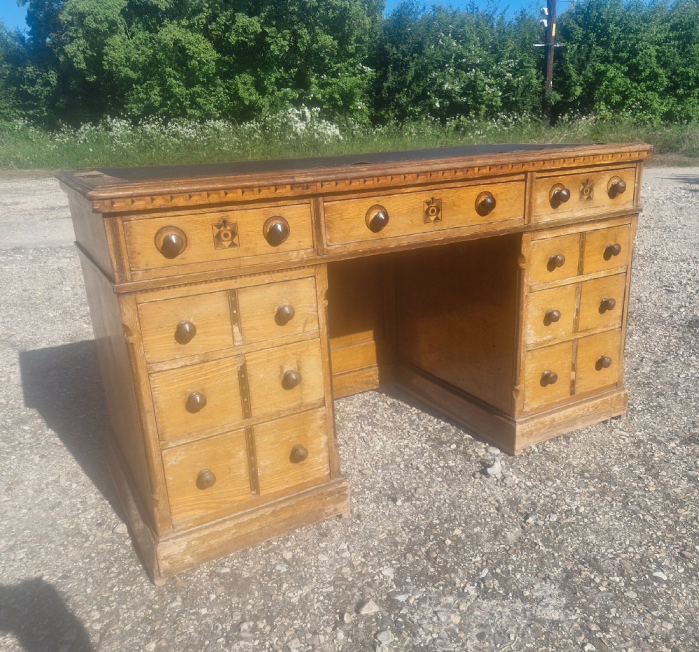 Victorian inlaid oak pedestal desk in the manner of Charles Bevan.