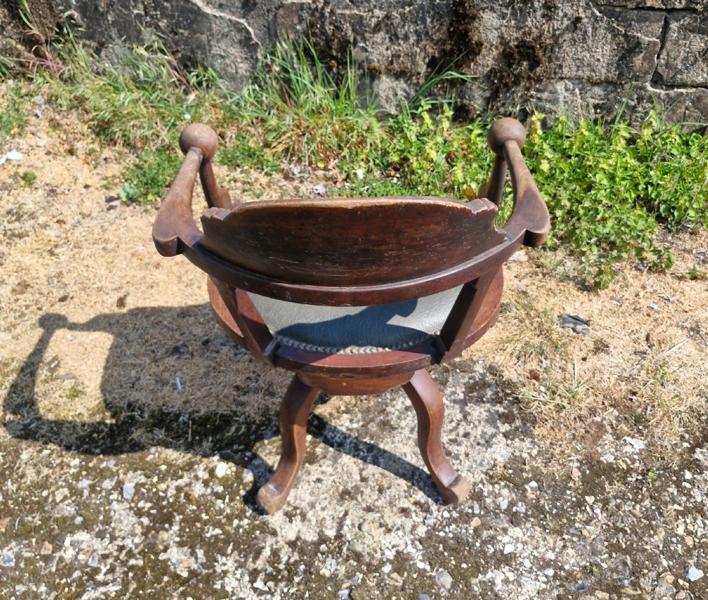 Late Victorian mahogany revolving desk armchair.  View II