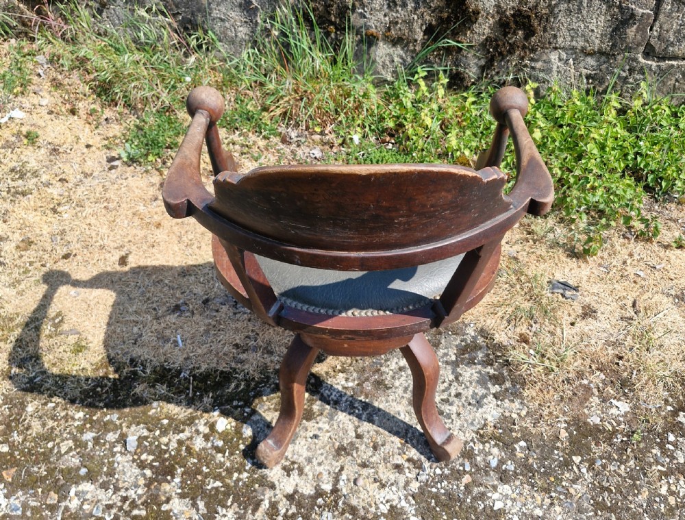 Late Victorian mahogany revolving desk armchair.  View III