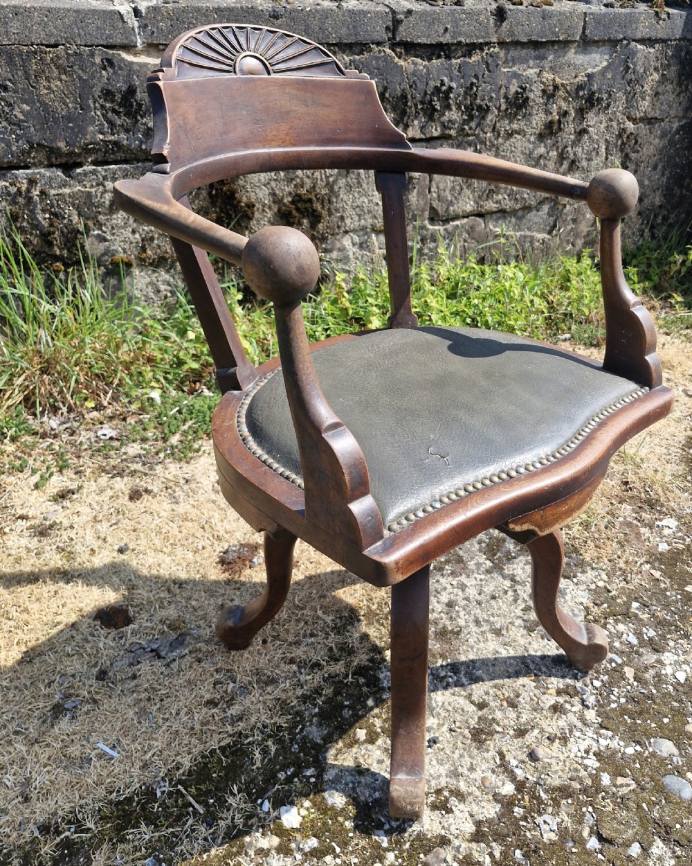 Late Victorian mahogany revolving desk armchair.  View IV