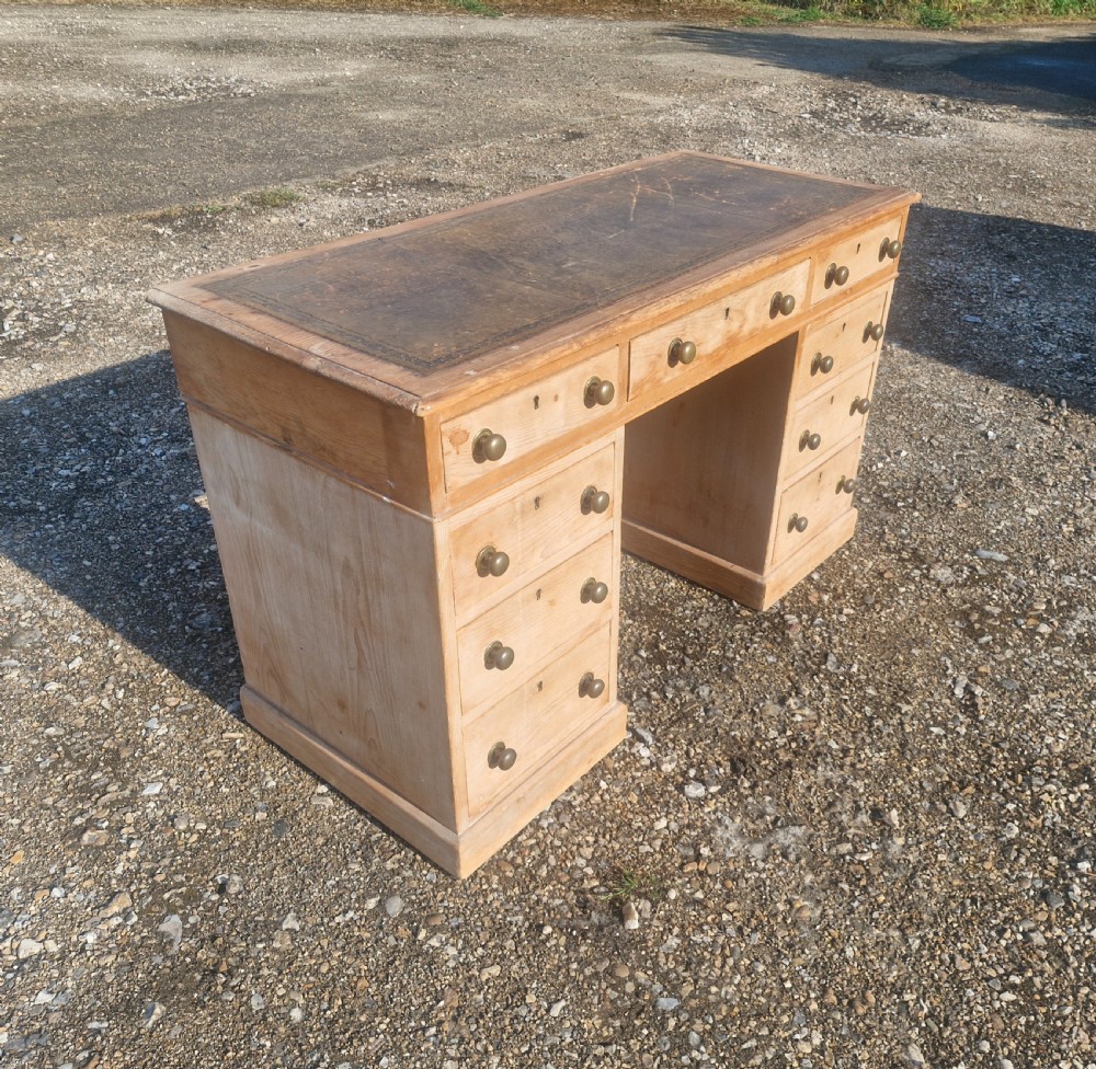 Late Victorian pine kneehole pedestal writing desk.  View VI