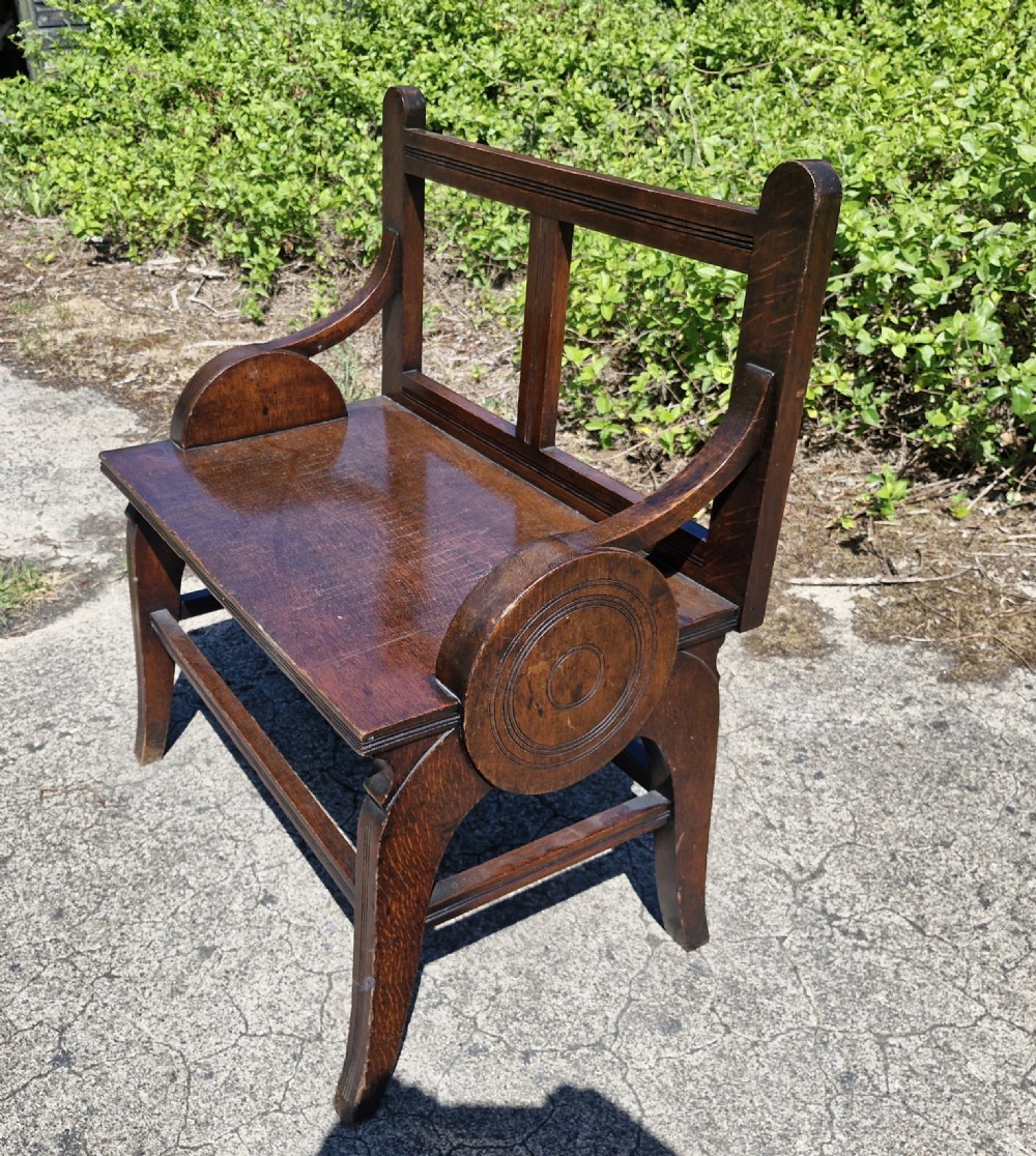 Oak Shoolbred & Co hall seat.
