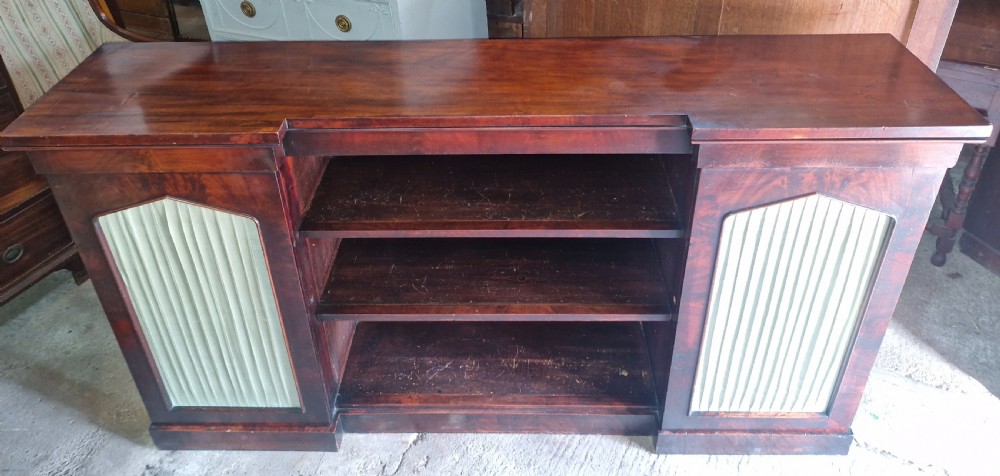 Regency mahogany inverted library bookcase cabinet fitted shelves and drawers.  View VII