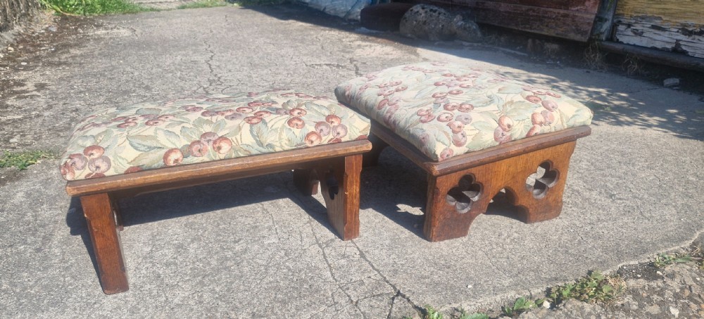 Pair of Victorian oak Gothic foot stools.