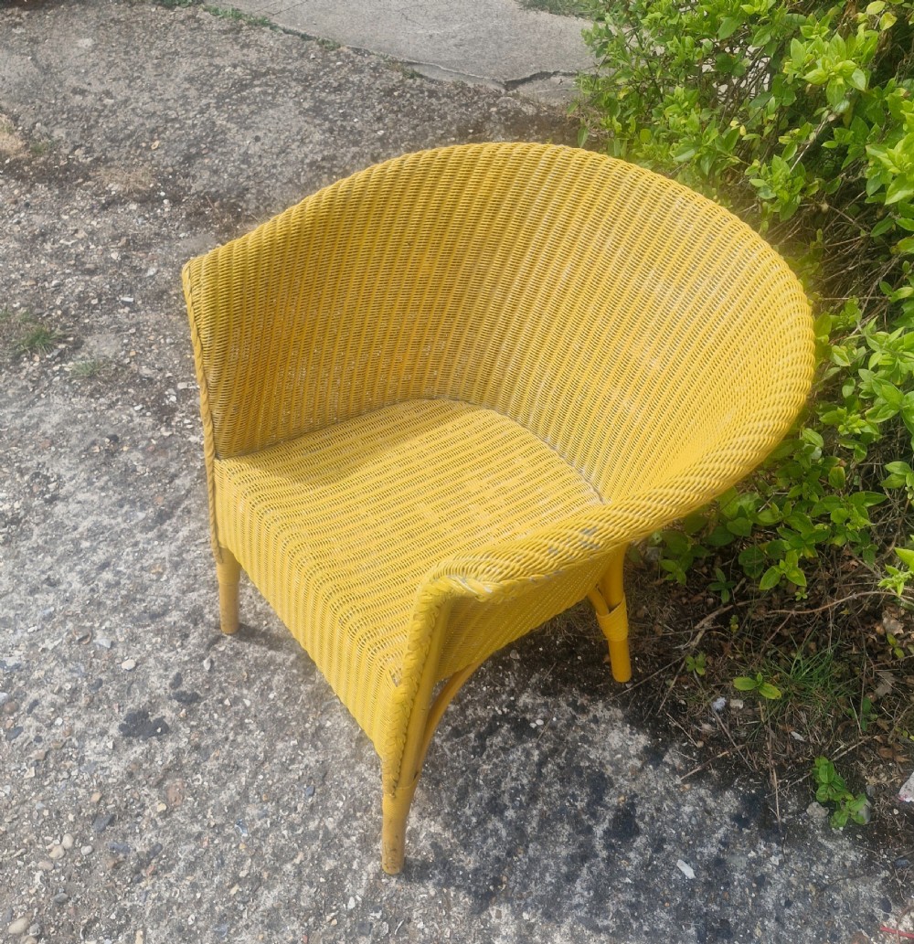 Lloyd Loom armchair.  View III