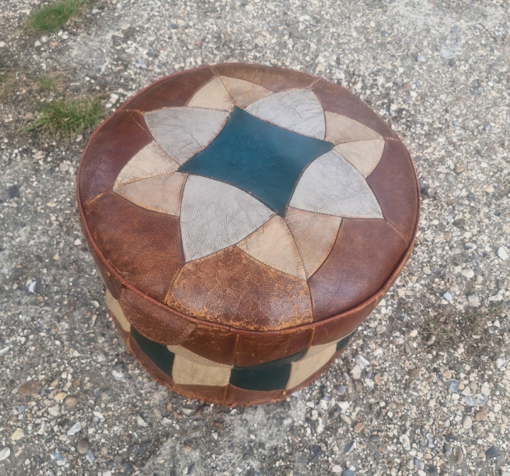Upholstered pouffe.  View V