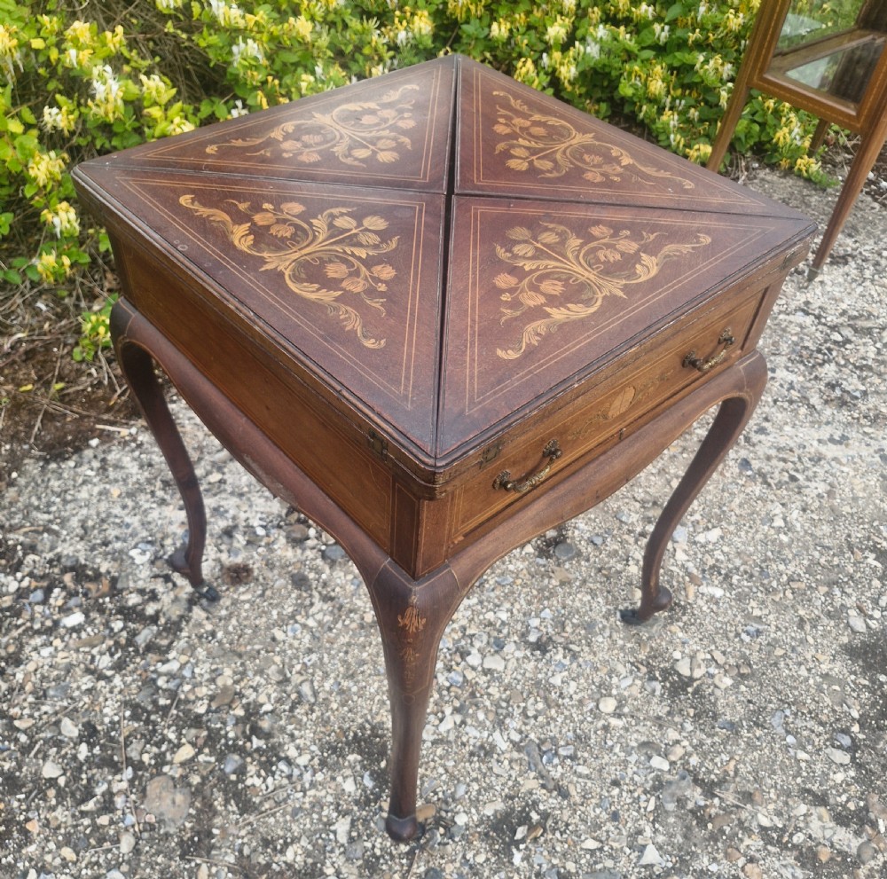 Edwardian inlaid mahogany swivel top games table.  View VI