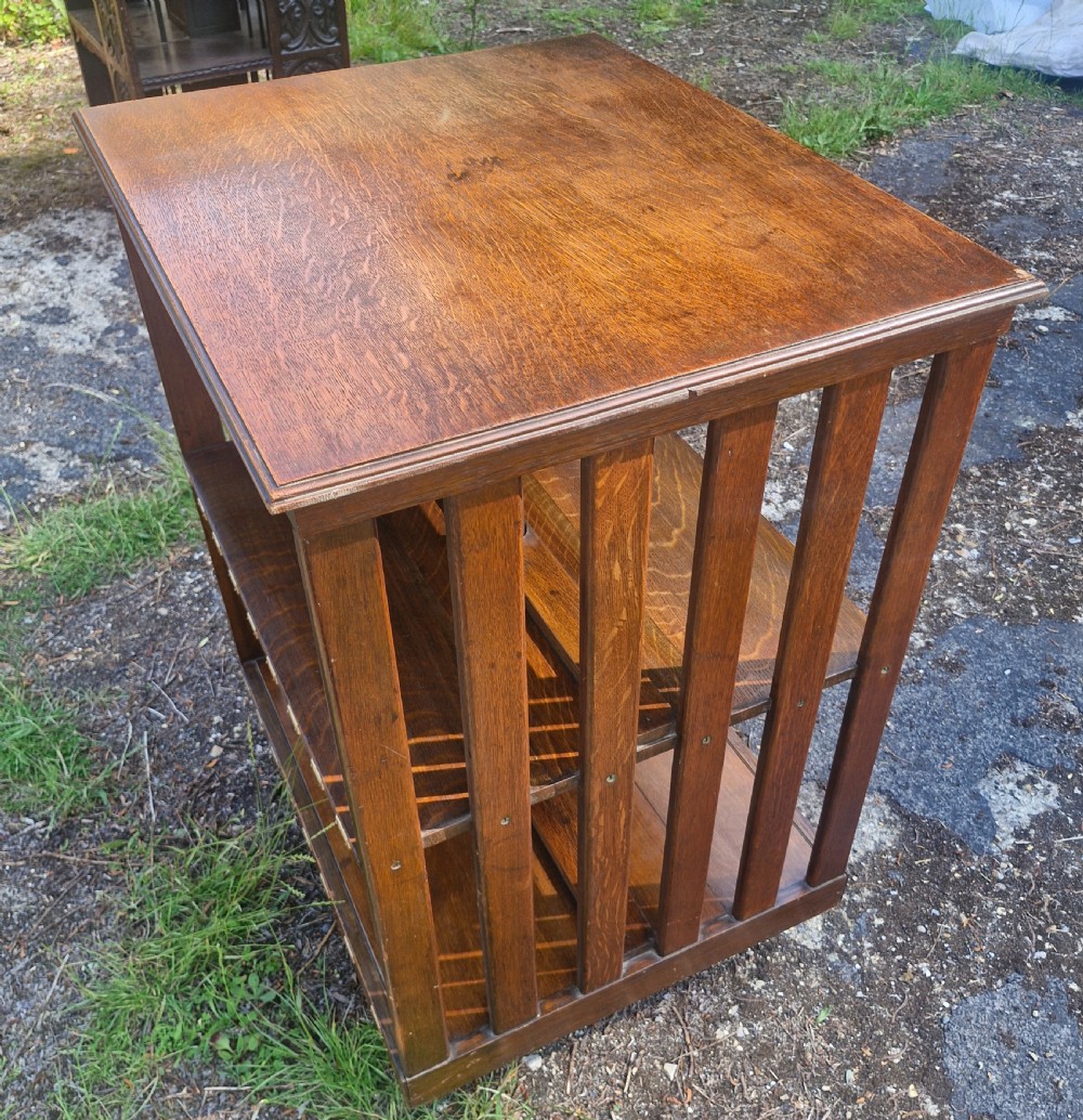 Edwardian oak revolving bookcase with adjustable reading slope.  View II