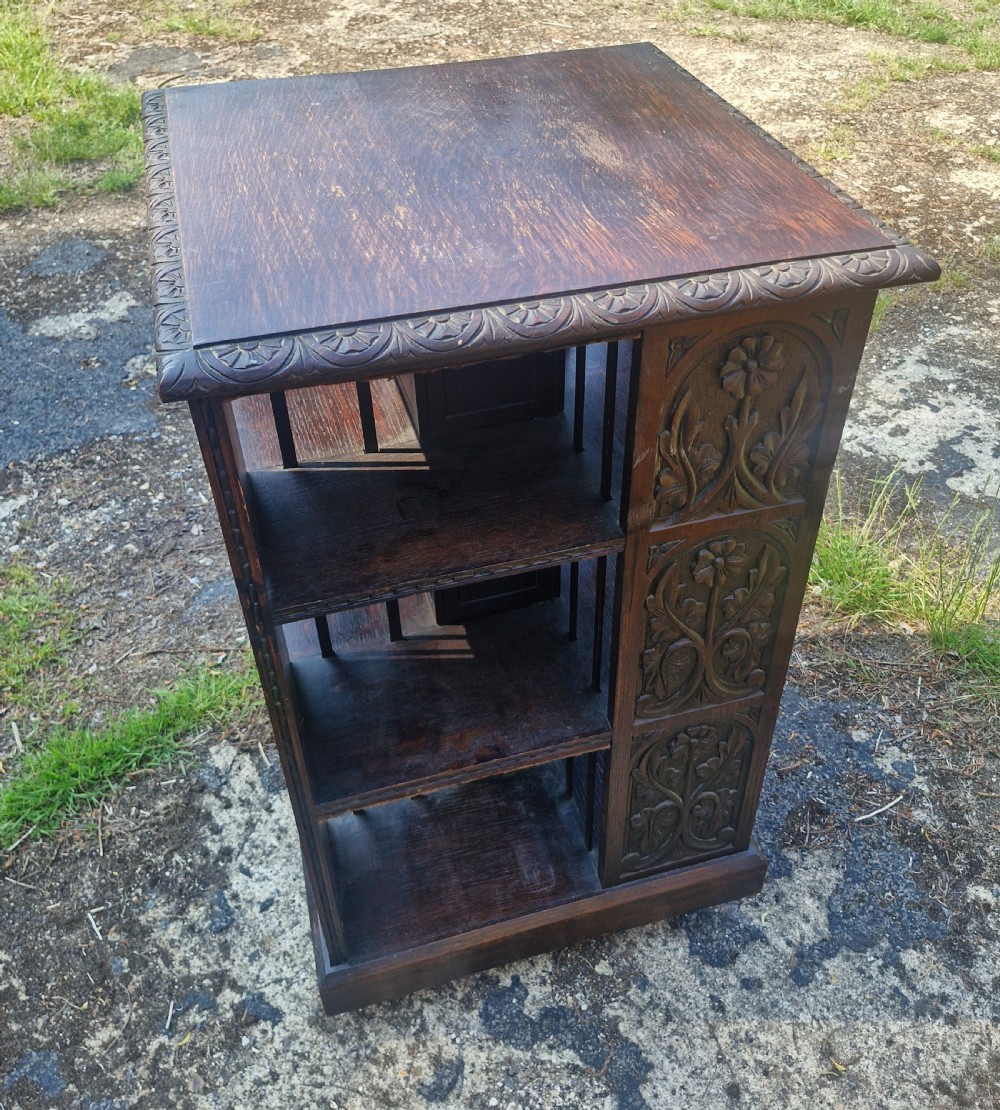 Late Victorian carved oak revolving bookcase.  View II