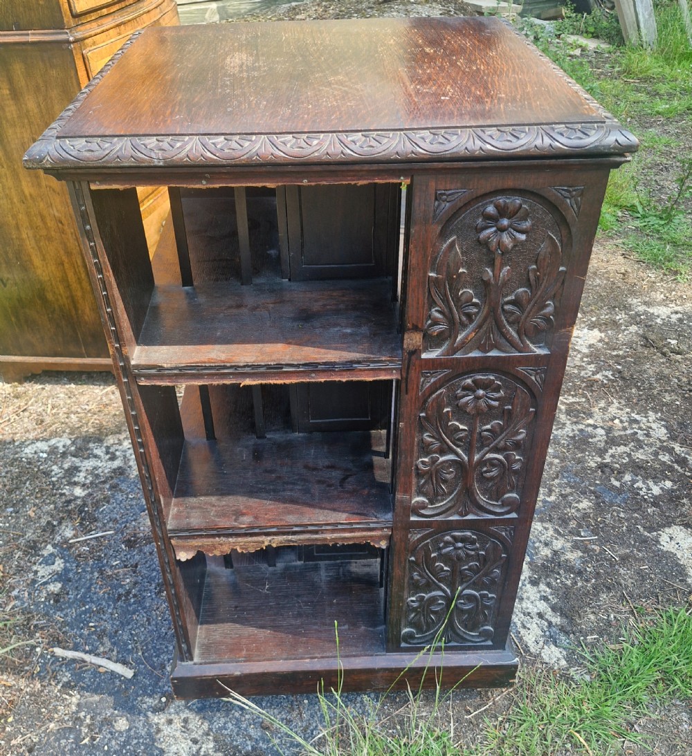 Late Victorian carved oak revolving bookcase.  View III