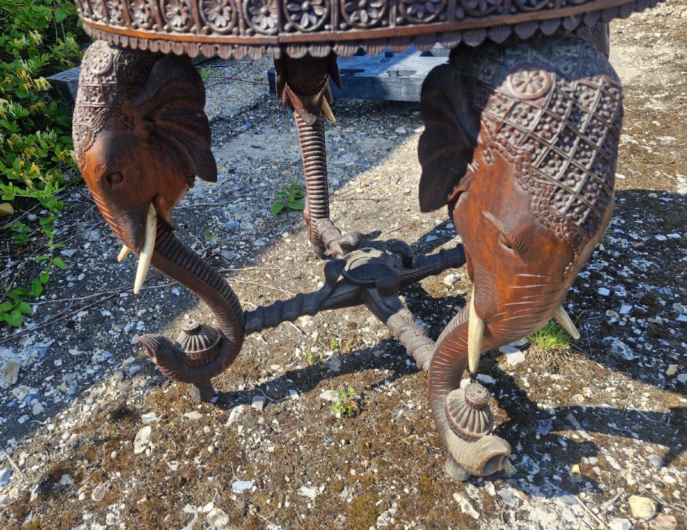 Large Carved Anglo Indian elephant table with wooden tusks. View III