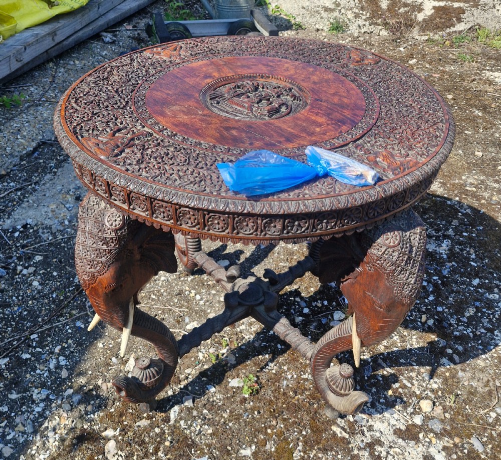 Large Carved Anglo Indian elephant table with wooden tusks. View VI