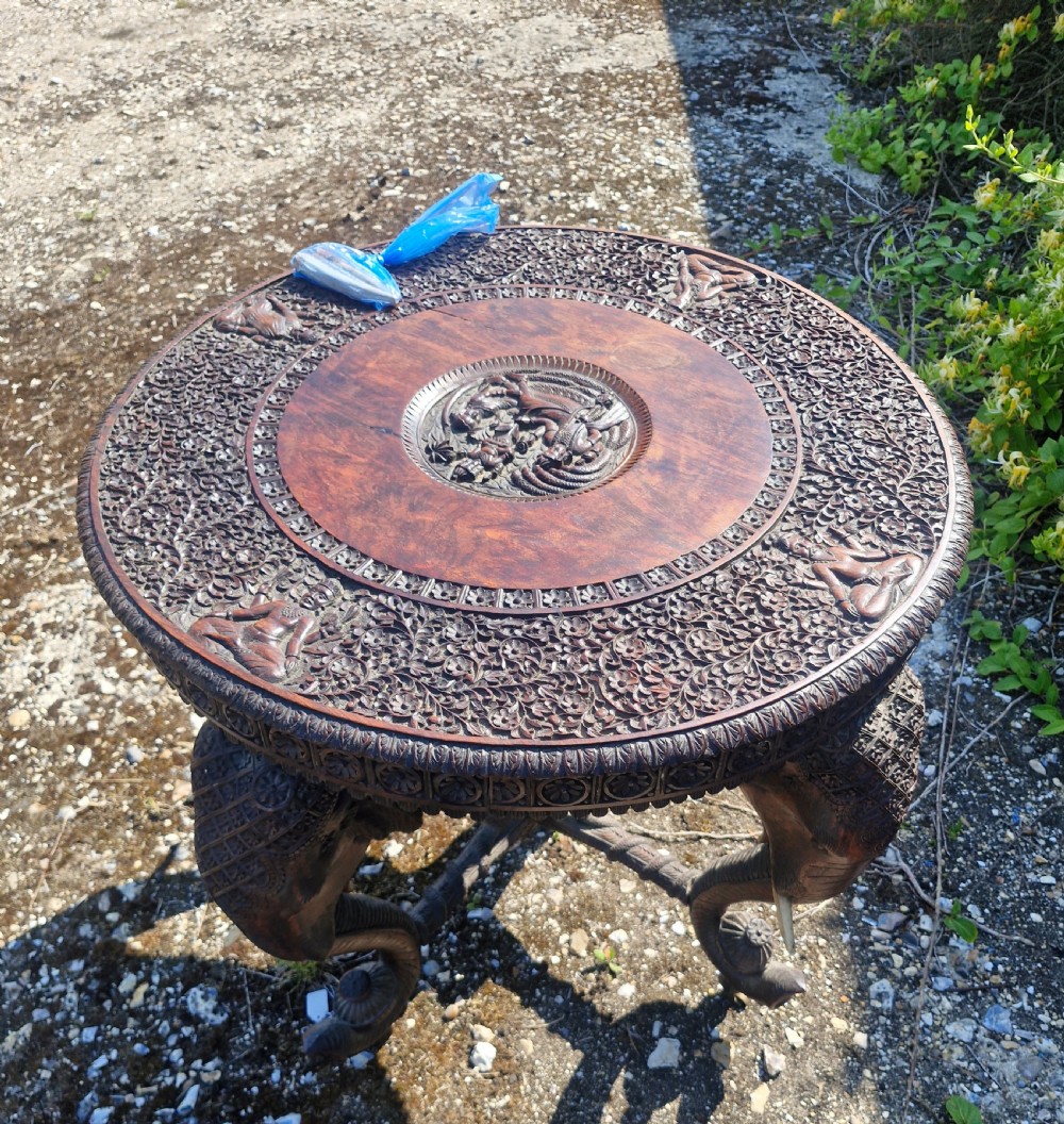 Large Carved Anglo Indian elephant table with wooden tusks. View VII