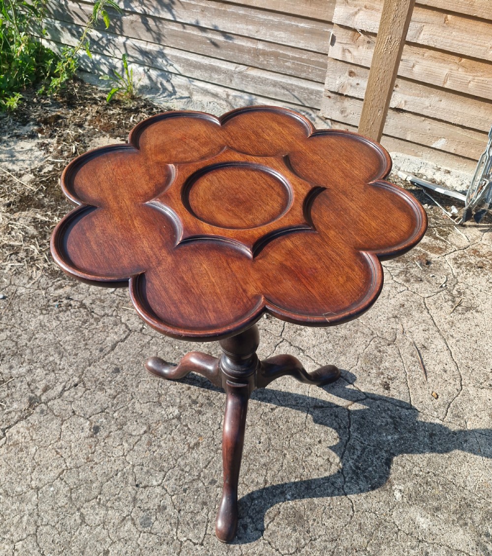 Antique mahogany tripod revolving occasional table. 