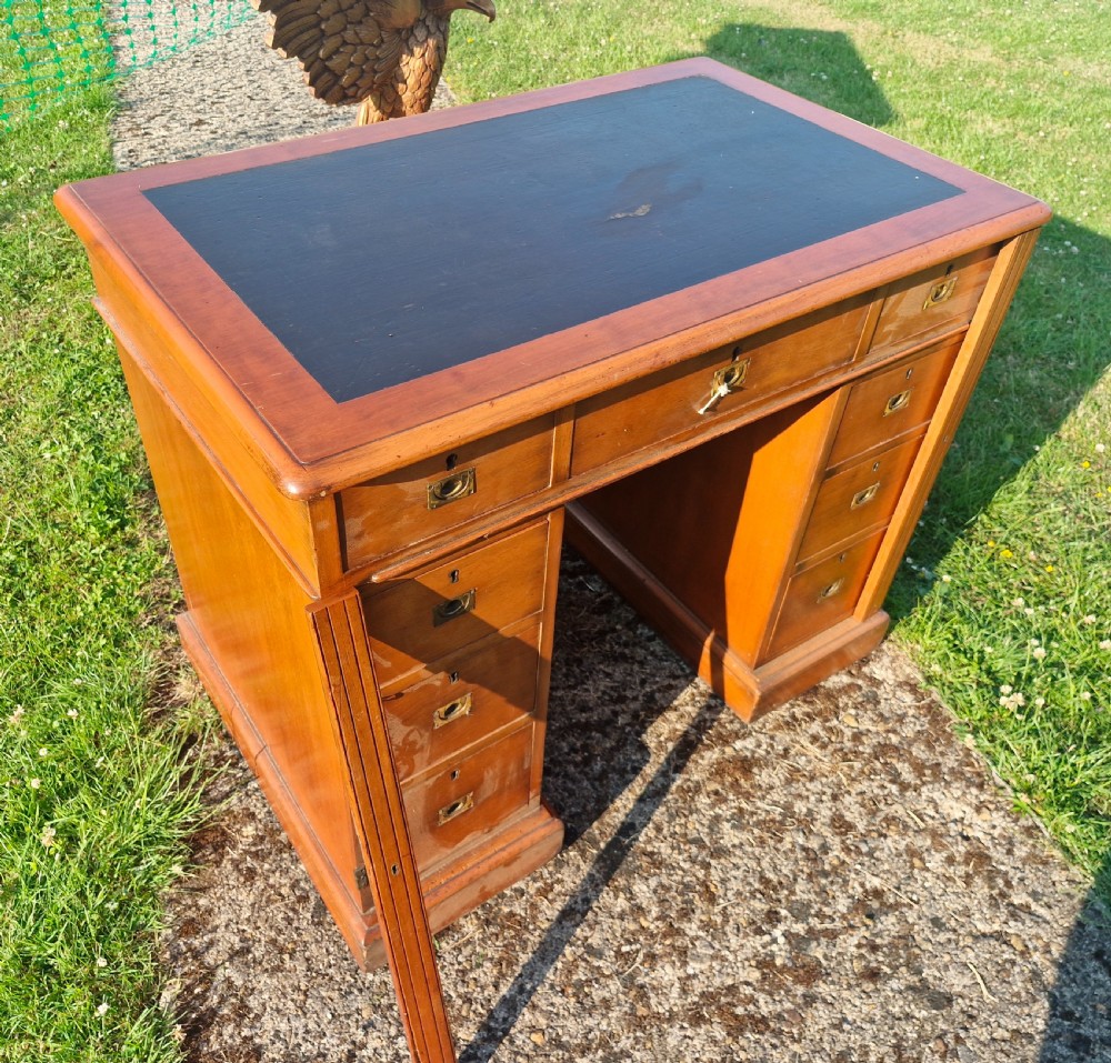 Small kneehole pedestal desk with Wellington type locking drawers. View III