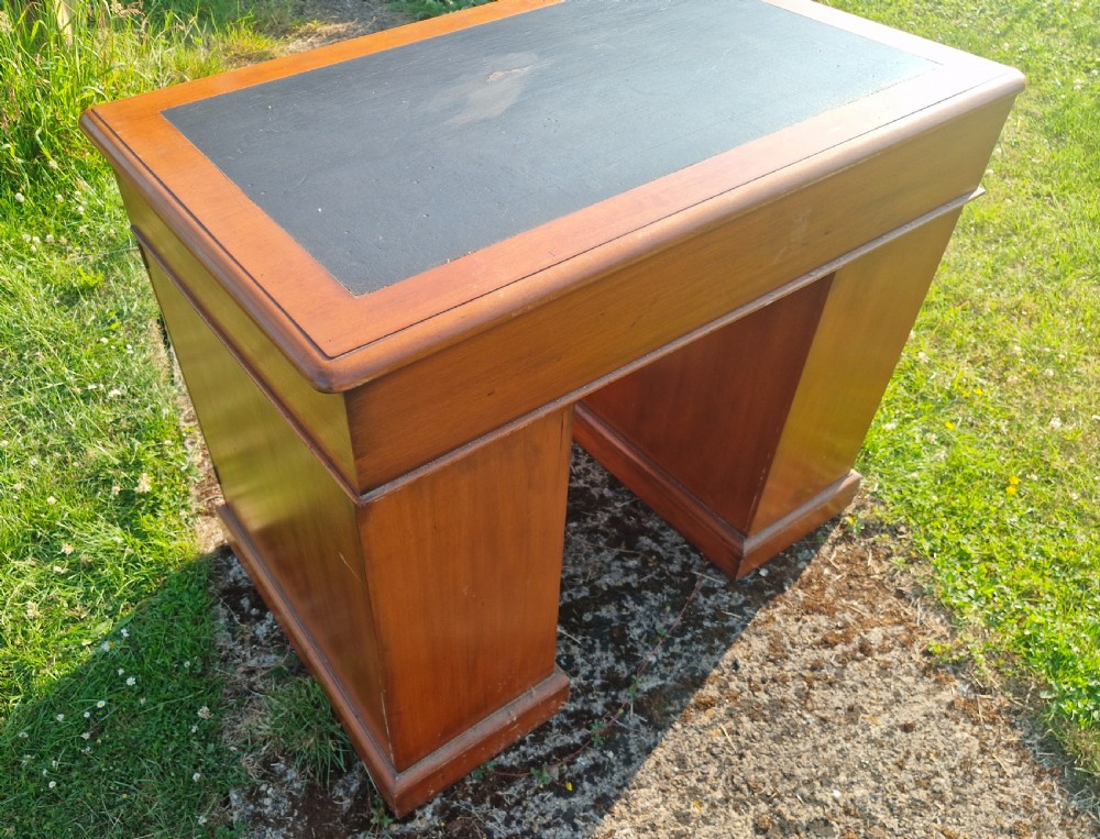Small kneehole pedestal desk with Wellington type locking drawers. View VI