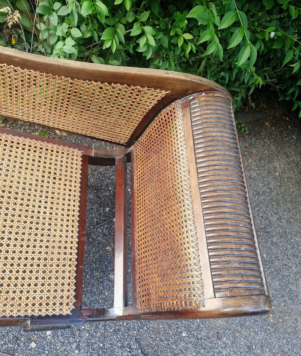 Caned chaise Longue with loose cushions.  View VIII