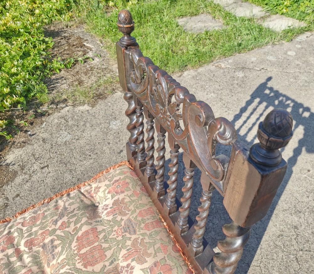 Early 18th century oak and walnut caned day bed. View IV