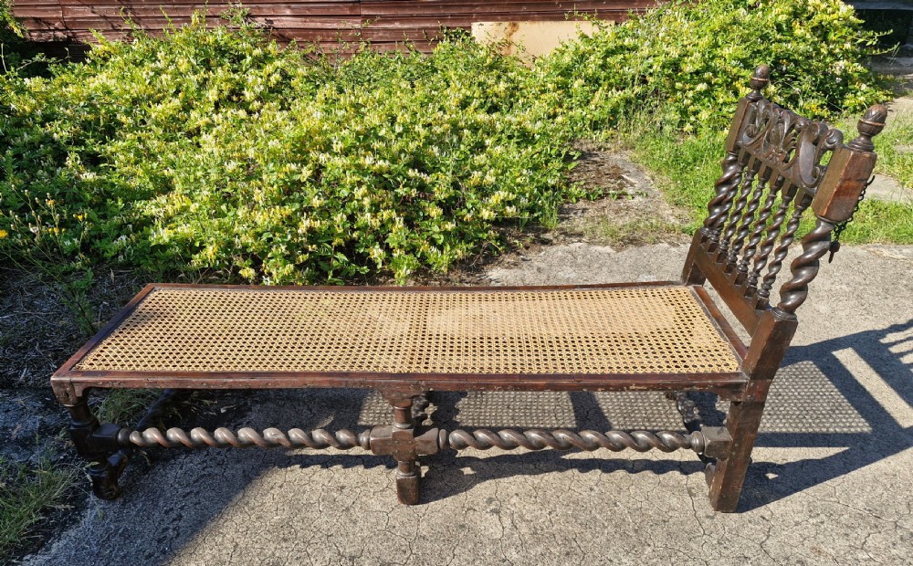 Early 18th century oak and walnut caned day bed. View VI