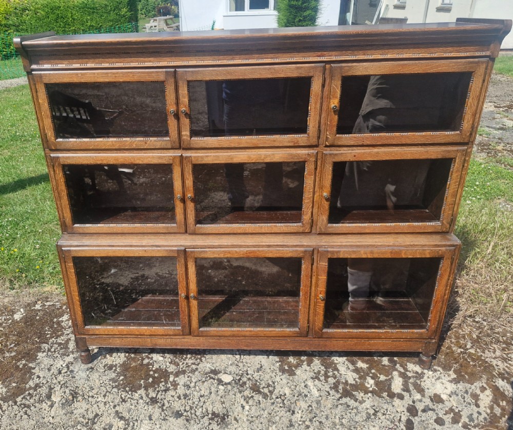 Oak 3 section glazed Minty Oxford bookcase. 