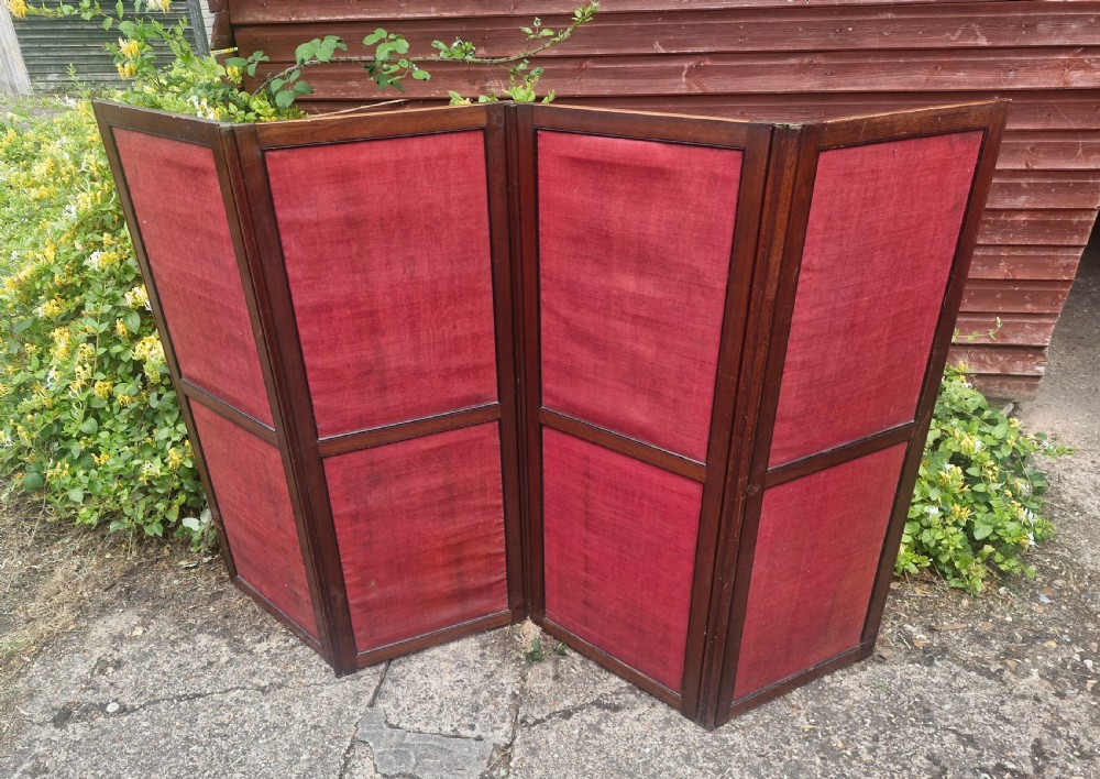 19th century mahogany gun barrel folding screen.