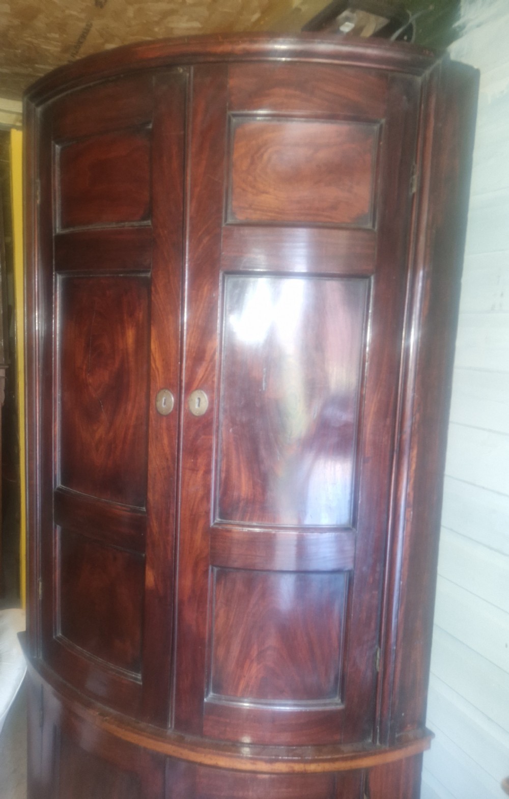 Georgian mahogany 4 door bow fron corner cupboard.  View XI