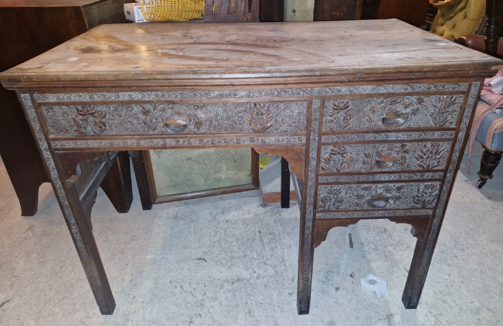 Carved Eastern single pedestal writing desk.  View IX