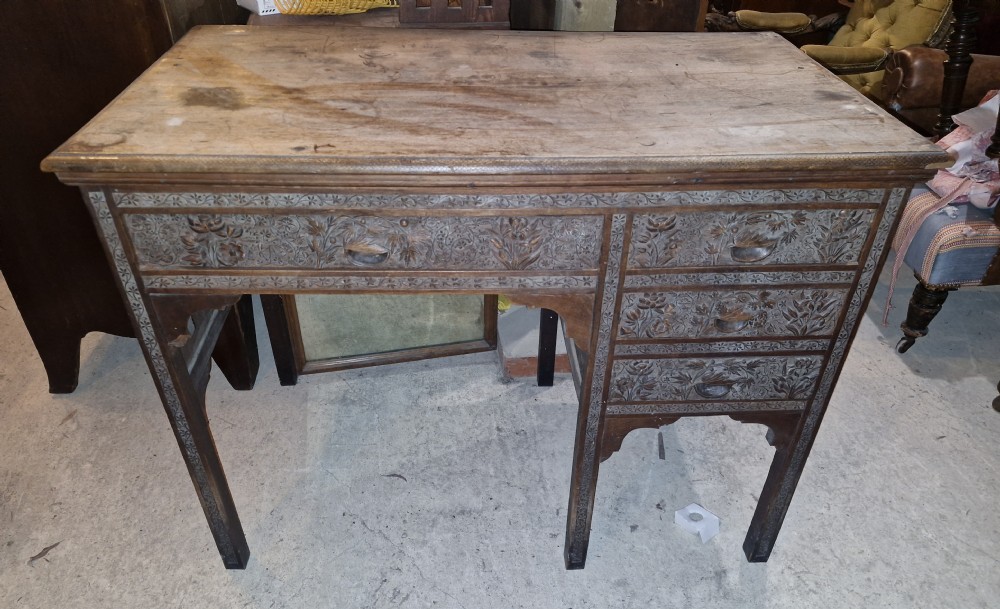 Carved Eastern single pedestal writing desk. 