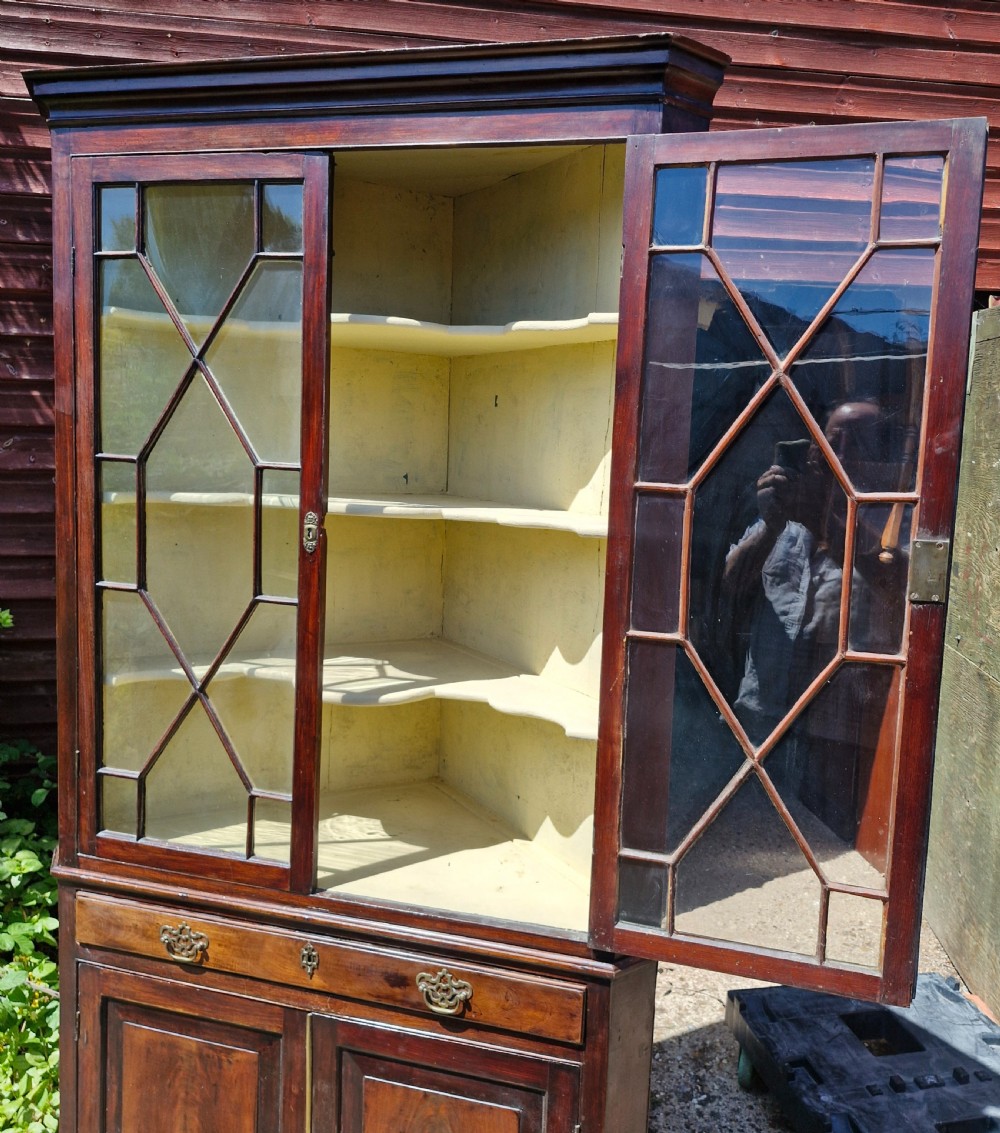 Early 19th century 2 part glazed corner cabinet.  View IV
