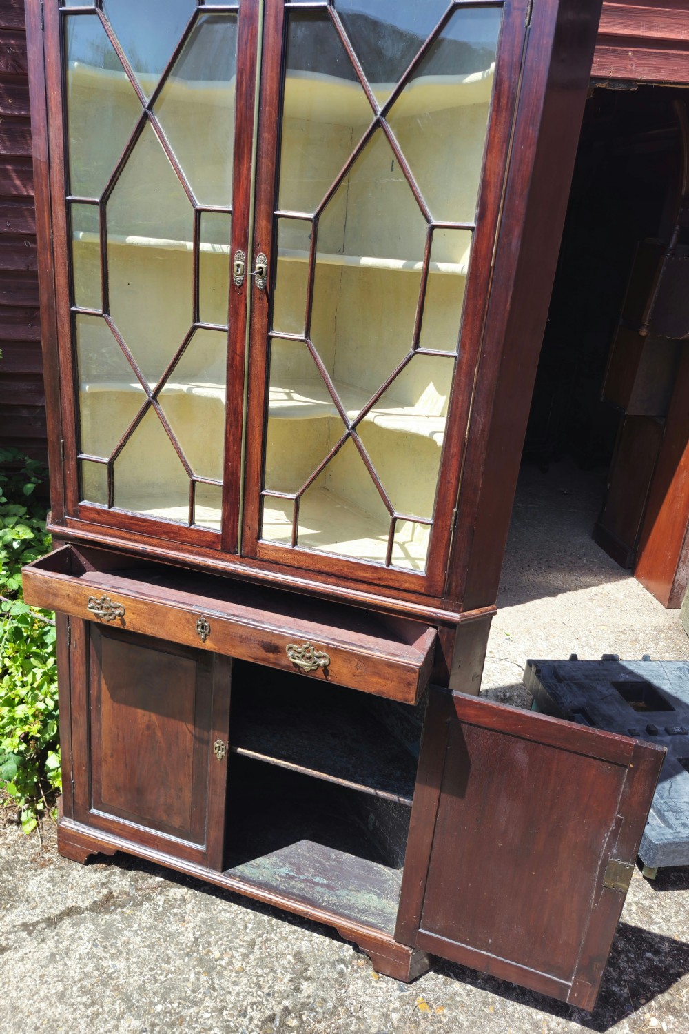 Early 19th century 2 part glazed corner cabinet.  View VI