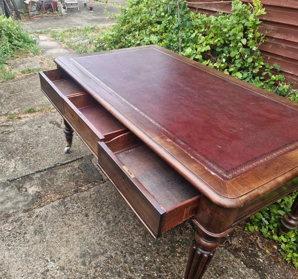 Mahogany partners writing table in the manner of Gillows.  View IX