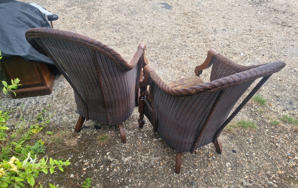 Rare pair of Oak framed Lloyd Loom Ladys and Gents armchairs. View II