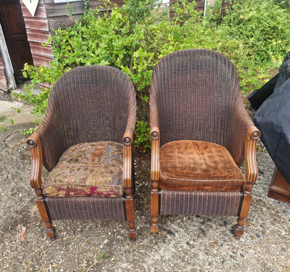 Rare pair of Oak framed Lloyd Loom Ladys and Gents armchairs. View VI