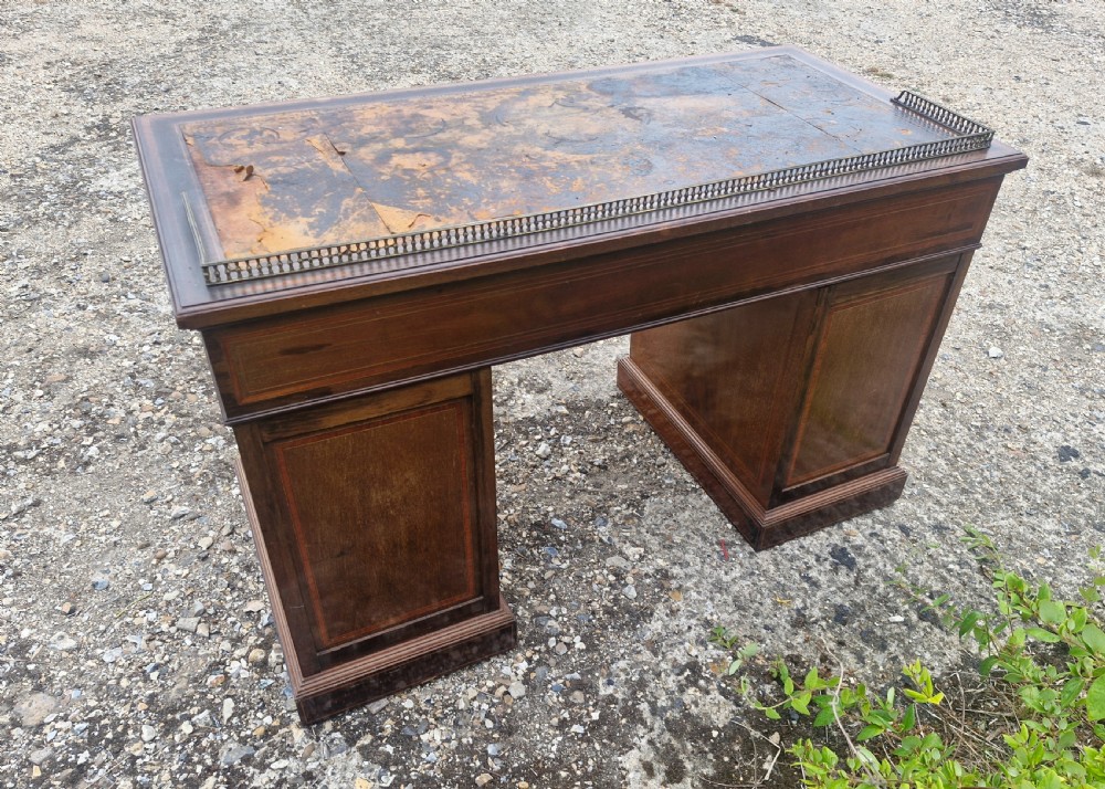 Edwardian inlaid mahogany kneehole pedestal writing desk.  View II
