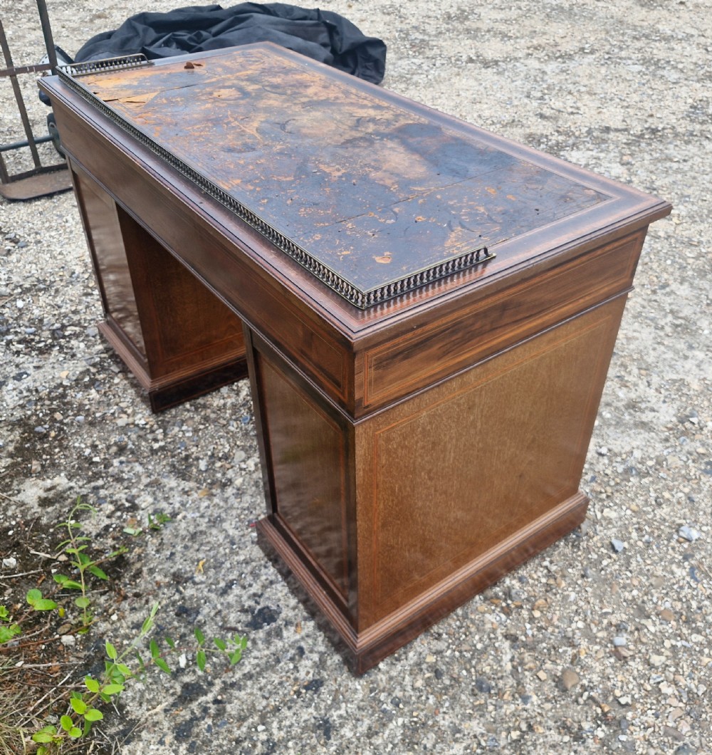 Edwardian inlaid mahogany kneehole pedestal writing desk.  View III