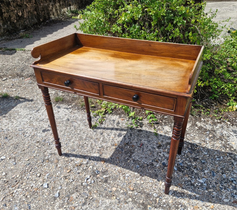 Regency mahogany writing table. 