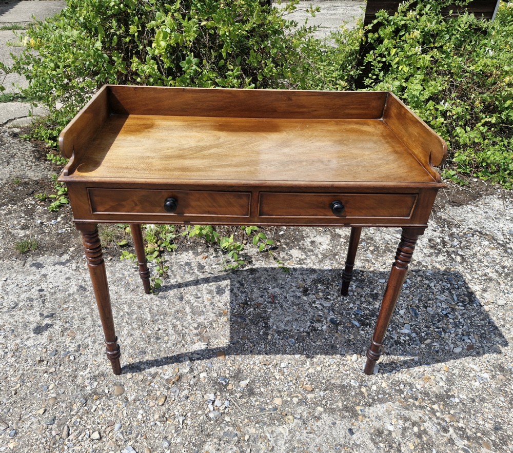 Regency mahogany writing table.  View IV