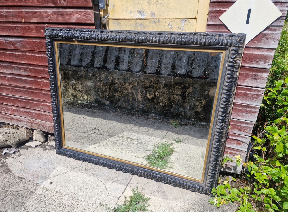 Impressive black and gilt Victorian wall mirror.  View IX