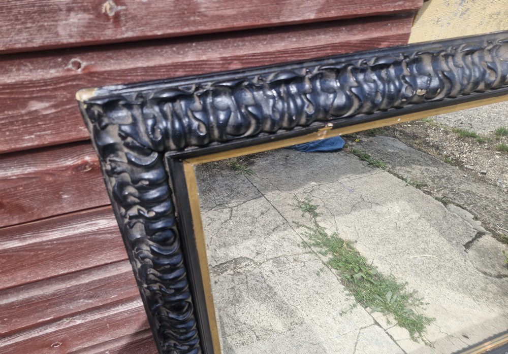 Impressive black and gilt Victorian wall mirror.  View XII