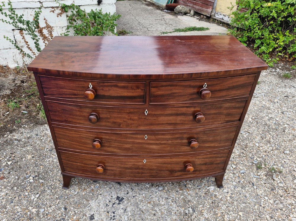 Good quality early 19th century mahogany bow front chest of drawers.  View IV