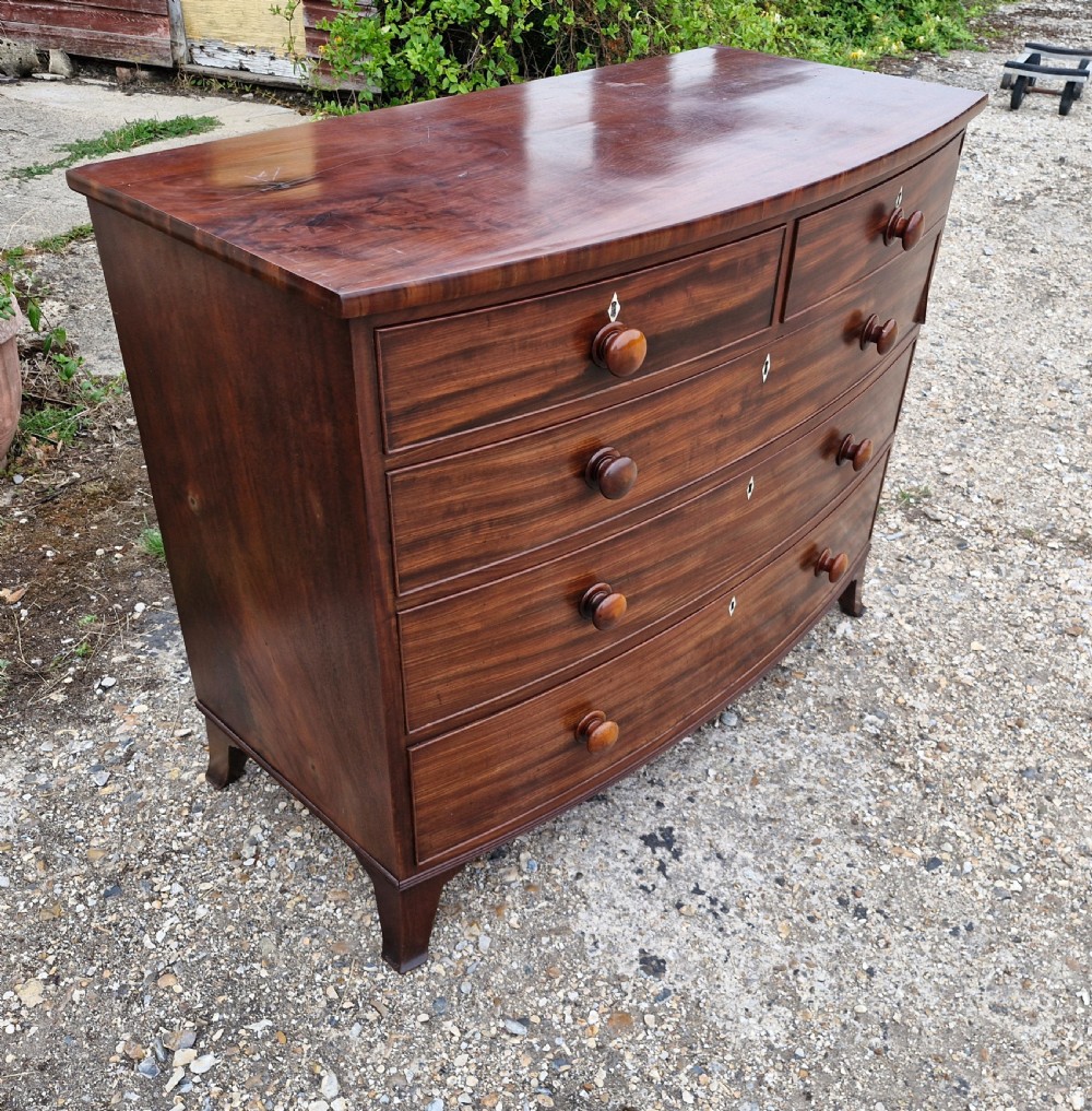 Good quality early 19th century mahogany bow front chest of drawers.  View V
