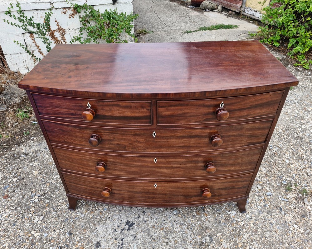 Good quality early 19th century mahogany bow front chest of drawers.  View VII