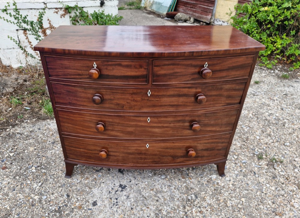 Good quality early 19th century mahogany bow front chest of drawers.  View VIII
