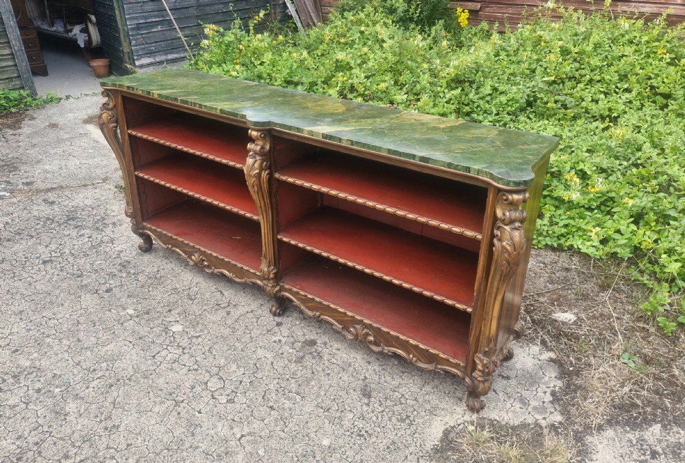 Good decorative open front bookcase with faux marble top. View X