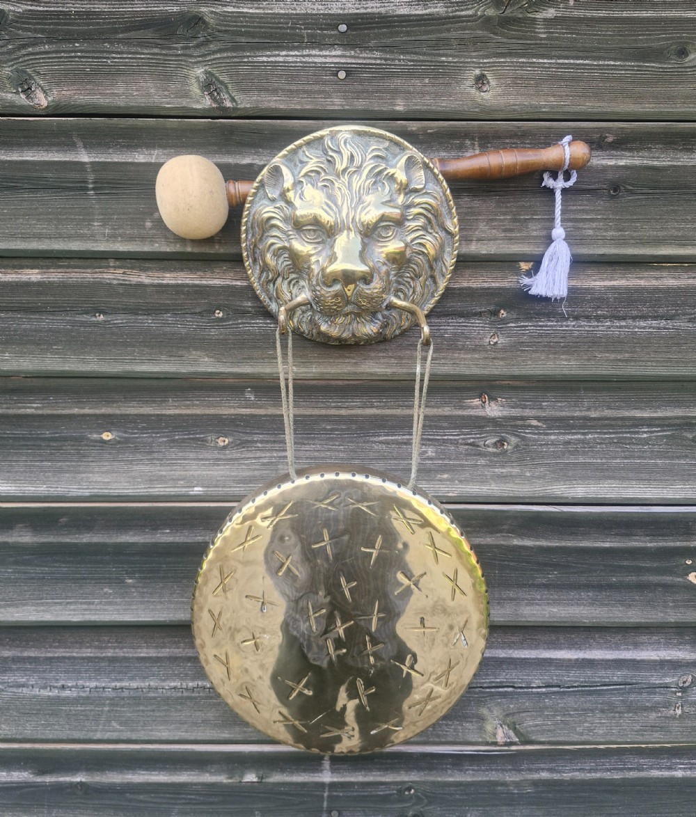 Wall mounted brass dinner gong. 